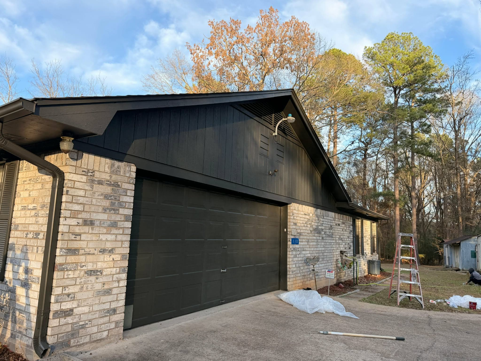 Professional exterior painting by South Arkansas Roofing LLC